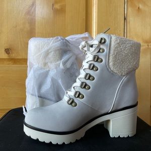 Gray and white boots